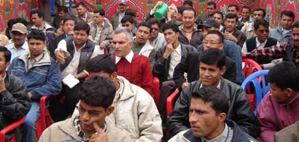 Editor Narayan Wagle, in red sweater, sorrounded by reporters of Kantipur Publications